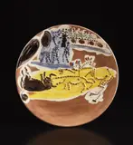 Arrastro by Pablo Picasso, 1959, White earthenware round platter, painted in colors with brushed glaze; ceramic, Madoura edition, sold Oct 2018