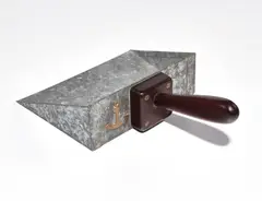 Dust Pan by H. C. Westermann, 1972, Galvanized sheet metal, brass, and Vermilion wood, sold Oct 2018
