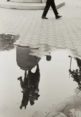 Washington Square After Rain by André Kertész, 1970, Gelatin silver print, sold Apr 2018