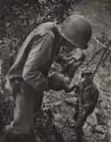 W. Eugene Smith, Saipan (Soldier Holding Baby)