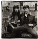 Young couple on a bench in Washington Square Park, N.Y.C. by Diane Arbus, 1965, Gelatin silver print, sold Oct 2018