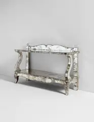 Serge Roche, Tiered console table, circa 1935, Mirrored glass-covered wood