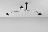 Serge Mouille, Three-arm adjustable ceiling light with "Casquette" shades, designed 1958, Painted aluminum, painted steel, brass
