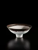 Footed bowl by Lucie Rie, 1984, Stoneware, matte white glaze with golden manganese lip, sold Jun 2018