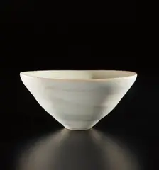 Conical bowl by Lucie Rie, 1970s, Porcelain, mixed clays producing a subtle integral spiral, sold Jun 2018