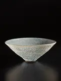 Large conical bowl by Lucie Rie, circa 1980, Stoneware, mixed clays producing an integral spiral of color and texture, sold Jun 2018