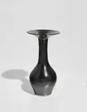 Bottle with flaring lip by Lucie Rie, circa 1962, Stoneware, mirror-black glaze, sold Jun 2018