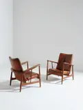 Pair of armchairs by Finn Juhl, circa 1953, Oak, teak, leather, brass nail heads, sold Jun 2018
