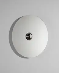 "Black Hole" mirror by Marc Newson, 2003, Mirror-polished stainless steel, sold Jun 2018