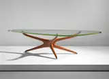 "Tri-symmetric" coffee table by Vladimir Kagan, circa 1953, Walnut, glass, sold Jun 2018
