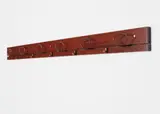 Studio B.B.P.R., Coat hanger, circa 1962, Walnut, patinated brass