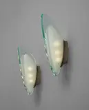Pair of wall lights, model no. 1552 by Max Ingrand, circa 1957, Glass, nickel-plated brass, sold Jun 2018