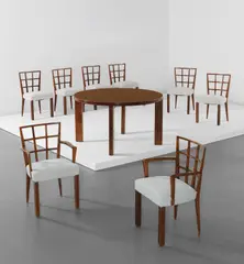 Dining table and eight chairs by Mario Quarti, circa 1930, Walnut, fabric, steel nailheads, offered Dec 2018