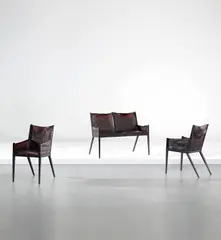 François-Claudius Compte-Calix, Rare children’s settee and pair of armchairs, circa 1938, Leather, painted iron