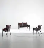 François-Claudius Compte-Calix, Rare children’s settee and pair of armchairs, circa 1938, Leather, painted iron