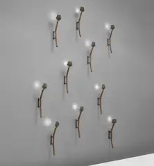 Kim Moltzer, Set of ten "Bamboo" wall lights, circa 2005, Bronze, painted metal, glass