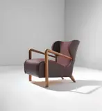 Jean Royere, Rare wingback armchair