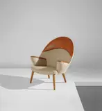 "Peacock" easy chair, model no. JH521 by Hans J. Wegner, circa 1953, Oak, fabric, leather, sold Dec 2018