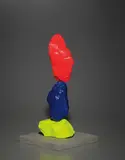 yellow blue red mountain by Ugo Rondinone, 2016, painted stone on concrete base, sold May 2017