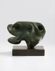 Animal Head by Henry Moore, 1951, bronze with green patina, on wood base, sold Nov 2017