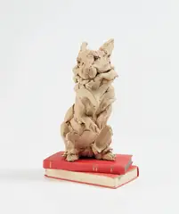 Stephanie Quayle, Rabbit, 2016, rich toasted stoneware, iron stone clay and books, in 3 parts