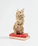 Stephanie Quayle, Rabbit, 2016, rich toasted stoneware, iron stone clay and books, in 3 parts