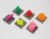 Six Small Mountains by Ugo Rondinone, 2016, painted stone on concrete base, in 6 parts, sold Nov 2017