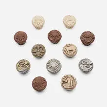 Edgar Miller, Zodiac model door knobs, set of twelve, composite