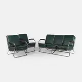 Wolfgang Hoffmann, Three-piece lounge suite, 1935, each piece with tubular chrome supports and sprung green cushions with cream piping