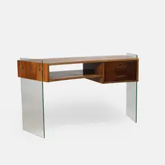 a desk, by Jacques Dumond, walnut and glass, sold Jul 2026