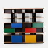 Charlotte Perriand, 'Nuage' bookcase, the fir frame with modular matte-lacquered-metal dividing panels and four anodised-aluminium sliding doors Private collection