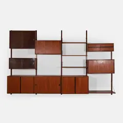 'Royal System' modular shelving unit by Poul Cadovius, teak with brass fittings and glass shelving, sold Jul 2026