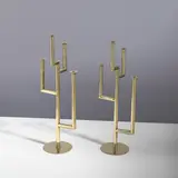 Paire de candélabres by Karl Hagenauer, An impressed pair of candelabras in brass designed by Karl Hagenauer circa 1930 and executed by Werkstätten Hagenauer Wi, offered Apr 2026
