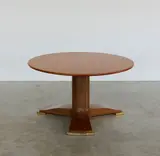 Table basse circulaire by Jules Leleu, offered Apr 2026