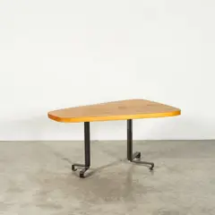 Table forme libre by Charlotte Perriand, A free-form table in fir and lacquered metal designed by Charlotte Perriand in 1987 for Aiguille Grive, Arc 1800, sold Apr 2026