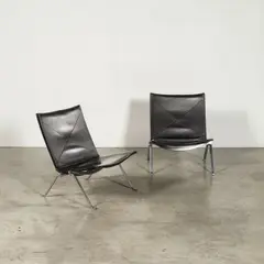 Paire de fauteuils PK22 by Poul Kjaerholm, An impressed pair of 'PK22' armchairs in chrome-plated steel and leather designed by Poul Kjaerholm in 1953 and edited b, sold Apr 2026