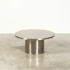 Table basse by Maria Pergay, A coffee table in brushed stainless steel, steel sheet and solid wood by Maria Pergay, sold Apr 2026