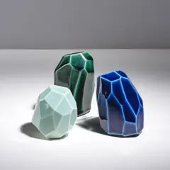 Ensemble de trois sculptures Roches by Kristin McKirdy, A set of three 'Roches' sculptures in glazed Sèvres porcelain by Kristin McKirdy and edited by the Manufacture nationale, sold Apr 2026