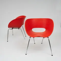 Paire de fauteuils Tom Vac by Ron Arad, A pair of 'Tom Vac' armchairs in mold polypropylene, steel and rubber designed by Ron Arad in 1999 and edited by Vitra i, offered Nov 2025