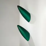 Philippe Starck, Paire d'appliques Luci Fair, A pair of 'Luci Fair' sconces in opaline glass and metal designed by Philippe Starck in 1989 and edited by Flos circa 1990
