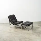 Travail Scandinave, Fauteuil et son ottoman, A Scandinavian armchair (damaged) and its ottoman in chrome-plated steel, leather and lacquered wood circa 1970