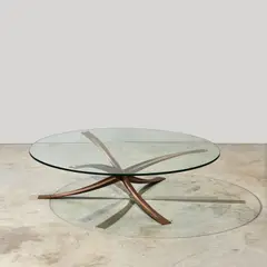 Michel Mangematin, Table basse, A coffee table in sand-cast stainless steel and glass designed by Michel Mangematin circa 1960 and executed by Ugine-Gueugnon
