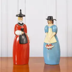 Robj, Deux flacons antropomorphes Vodka et Guignolet, Two 'Vodka' and 'Guignolet' antropomorphic bottles in glazed porcelain by Robj after a LeSeyeux drawing circa 1929