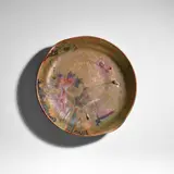 Lucien Lévy-Dhurmer, Charger, for Clément Massier, stoneware with iridescent glaze, painted mark 'CLEMENT MASSiER GolfE JUAN A