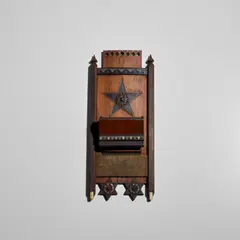 Match Striker by Carlo Bugatti, polished and ebonized walnut inlaid with pewter, bone and copper, emery board strike, sold Oct 2025