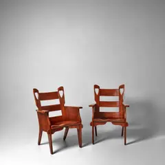 Herman Devries, Pair of 'Heart' Armchairs, for Cushman Colonial Creation, carved maple, stamped 'CUSHMAN 4 - 181A', metal tag 'A GENUINE CUSHMAN COLONIAL CREATION NO