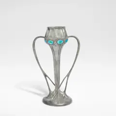 Archibald Knox, for Liberty & Co., circa 1905, Pewter, of twin handled form, the sides set with enamelle cabochons