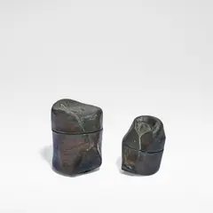 Two lidded jars by Mary Rogers, Earthenware, iron glaze to exterior and interior, sold Sep 2025