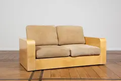 Canapé by Aldo Tura, A sofa in varnished parchment, leather, chipboard and casters by Aldo Tura circa 1960, offered Jan 2025