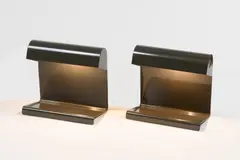 Jean Prouvé, Paire de lampes de bureau, A pair of office desks in lacquered steel designed by Jean Prouvé in 1930 and edited by Vitra G-Star RAW in 2015